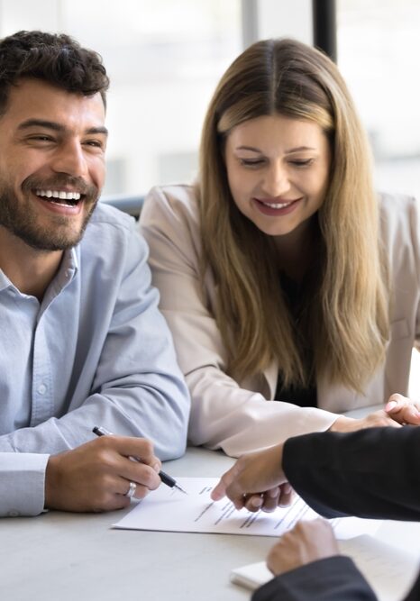 Couple signing a contract