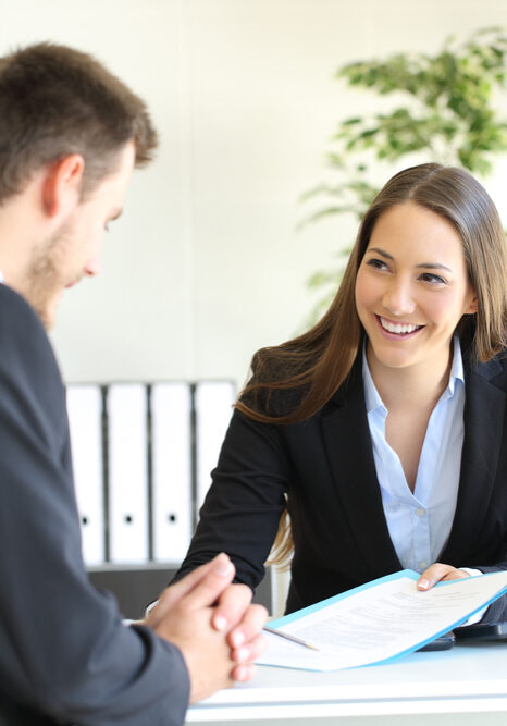 Solicitor going through a contract with client.